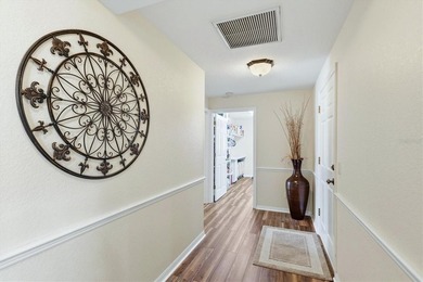 Pride of ownership shines in this well-maintained 1961 on Deep Creek Golf Club in Florida - for sale on GolfHomes.com, golf home, golf lot