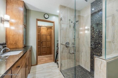 This impeccably maintained Priest Lake home perfectly blends on Priest Lake Golf and Tennis Club in Idaho - for sale on GolfHomes.com, golf home, golf lot