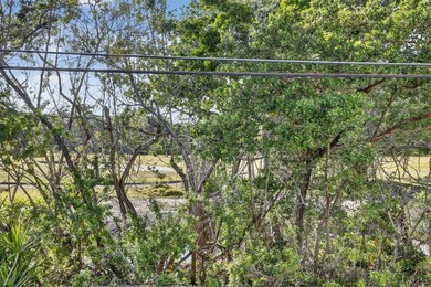 LIVE THE FLORIDA LIFESTYLE IN THIS 1 BED/1 BATH UNIT ON A PALM on Eco Golf Club in Florida - for sale on GolfHomes.com, golf home, golf lot