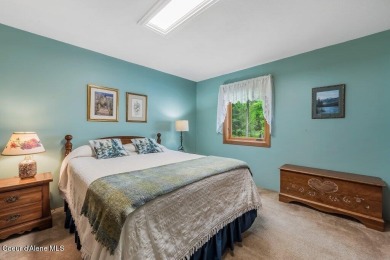 This impeccably maintained Priest Lake home perfectly blends on Priest Lake Golf and Tennis Club in Idaho - for sale on GolfHomes.com, golf home, golf lot