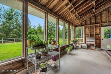 This impeccably maintained Priest Lake home perfectly blends on Priest Lake Golf and Tennis Club in Idaho - for sale on GolfHomes.com, golf home, golf lot