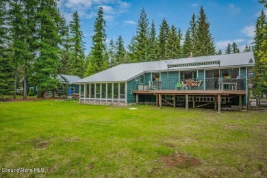 This impeccably maintained Priest Lake home perfectly blends on Priest Lake Golf and Tennis Club in Idaho - for sale on GolfHomes.com, golf home, golf lot
