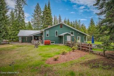 This impeccably maintained Priest Lake home perfectly blends on Priest Lake Golf and Tennis Club in Idaho - for sale on GolfHomes.com, golf home, golf lot