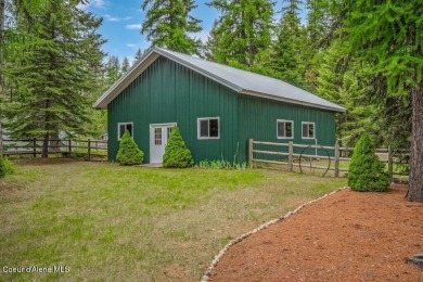 This impeccably maintained Priest Lake home perfectly blends on Priest Lake Golf and Tennis Club in Idaho - for sale on GolfHomes.com, golf home, golf lot
