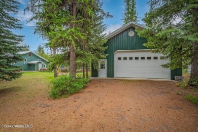 This impeccably maintained Priest Lake home perfectly blends on Priest Lake Golf and Tennis Club in Idaho - for sale on GolfHomes.com, golf home, golf lot