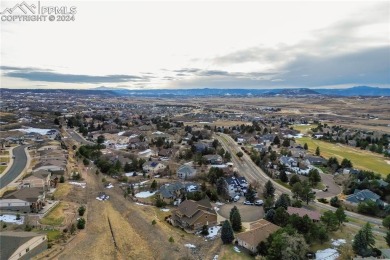 Set on a spacious lot with plenty of room between neighbors on Plum Creek Golf and Country Club in Colorado - for sale on GolfHomes.com, golf home, golf lot