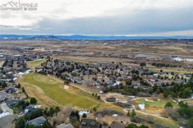 Set on a spacious lot with plenty of room between neighbors on Plum Creek Golf and Country Club in Colorado - for sale on GolfHomes.com, golf home, golf lot