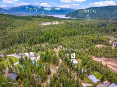 This impeccably maintained Priest Lake home perfectly blends on Priest Lake Golf and Tennis Club in Idaho - for sale on GolfHomes.com, golf home, golf lot