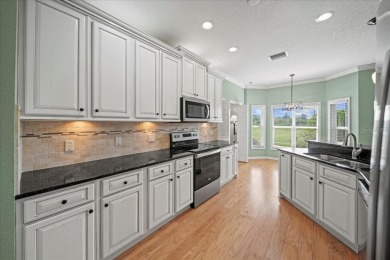 Welcome to this stunning home in the highly sought-after Lake on Lake Ashton Golf Club in Florida - for sale on GolfHomes.com, golf home, golf lot