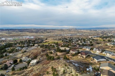 Set on a spacious lot with plenty of room between neighbors on Plum Creek Golf and Country Club in Colorado - for sale on GolfHomes.com, golf home, golf lot