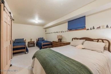 This impeccably maintained Priest Lake home perfectly blends on Priest Lake Golf and Tennis Club in Idaho - for sale on GolfHomes.com, golf home, golf lot