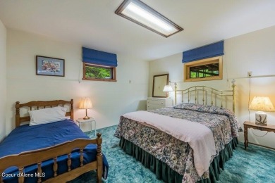 This impeccably maintained Priest Lake home perfectly blends on Priest Lake Golf and Tennis Club in Idaho - for sale on GolfHomes.com, golf home, golf lot