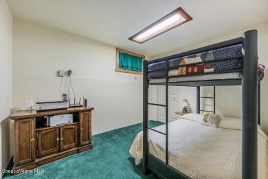 This impeccably maintained Priest Lake home perfectly blends on Priest Lake Golf and Tennis Club in Idaho - for sale on GolfHomes.com, golf home, golf lot