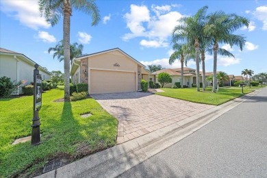 Welcome to this stunning home in the highly sought-after Lake on Lake Ashton Golf Club in Florida - for sale on GolfHomes.com, golf home, golf lot
