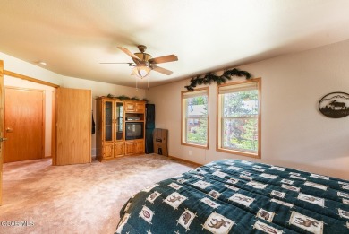 This turnkey furnished 3bd/2bath Ranch sits on a full third acre on Grand Lake Golf Course in Colorado - for sale on GolfHomes.com, golf home, golf lot