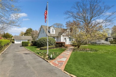 Welcome to 1440 Roanoke Ave, a charming cape-style home nestled on Sandy Pond Golf Course in New York - for sale on GolfHomes.com, golf home, golf lot