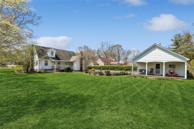 Welcome to 1440 Roanoke Ave, a charming cape-style home nestled on Sandy Pond Golf Course in New York - for sale on GolfHomes.com, golf home, golf lot