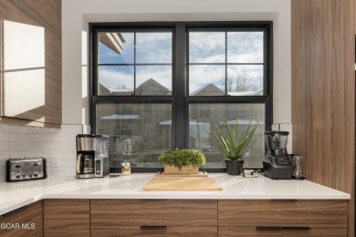 Experience immediate mountain living with this turnkey 3-story on Headwaters Golf Course At Granby Ranch in Colorado - for sale on GolfHomes.com, golf home, golf lot