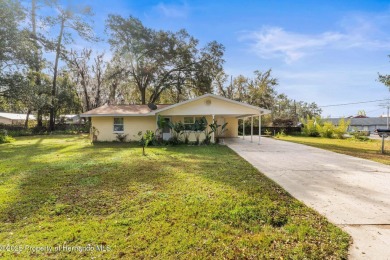 Charming Ranch-Style Home with a Backyard Paradise, Just Minutes on Quarry Golf Course in Florida - for sale on GolfHomes.com, golf home, golf lot