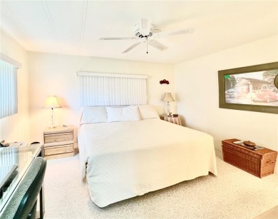 This impeccably situated 2-bedroom, 2-bathroom residence offers on Fairway Village Golf Course in Florida - for sale on GolfHomes.com, golf home, golf lot