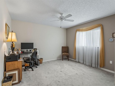 Newly Renovated Home Overlooking Golf Course, Large Water View on The Links of Spruce Creek in Florida - for sale on GolfHomes.com, golf home, golf lot