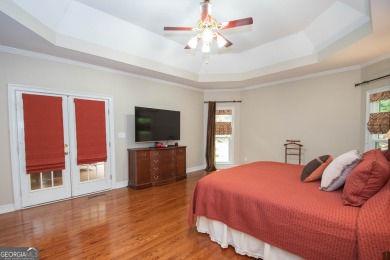Welcome to this stunning custom ranch home in the prestigious on Whitewater Creek in Georgia - for sale on GolfHomes.com, golf home, golf lot