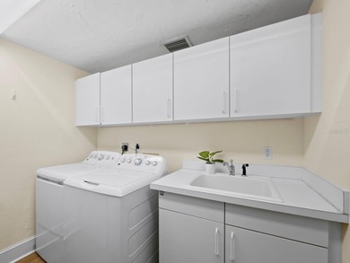 Arrive by private elevator into this 2BR + den, 3.5BA residence on Longboat Key Golf Club Resort in Florida - for sale on GolfHomes.com, golf home, golf lot