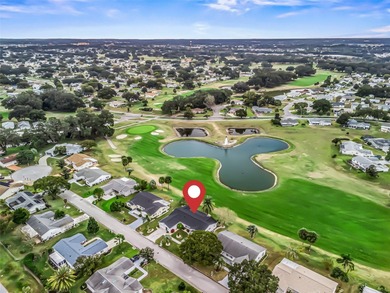 Newly Renovated Home Overlooking Golf Course, Large Water View on The Links of Spruce Creek in Florida - for sale on GolfHomes.com, golf home, golf lot