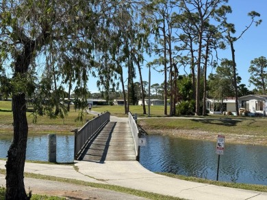 This lovely, manufactured home on leased land is located in Lake on Pine Lakes Country Club in Florida - for sale on GolfHomes.com, golf home, golf lot