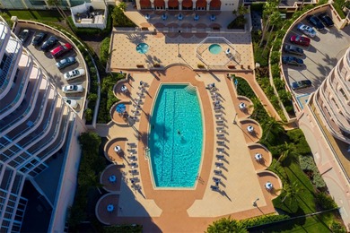 Arrive by private elevator into this 2BR + den, 3.5BA residence on Longboat Key Golf Club Resort in Florida - for sale on GolfHomes.com, golf home, golf lot