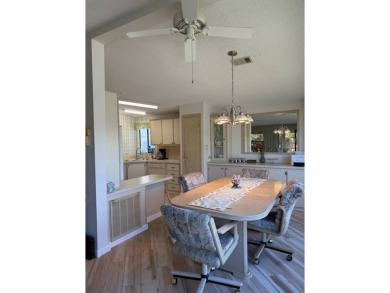 This lovely, manufactured home on leased land is located in Lake on Pine Lakes Country Club in Florida - for sale on GolfHomes.com, golf home, golf lot