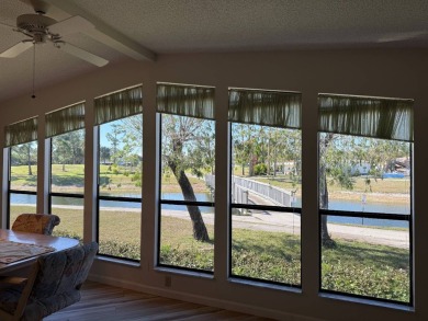 This lovely, manufactured home on leased land is located in Lake on Pine Lakes Country Club in Florida - for sale on GolfHomes.com, golf home, golf lot