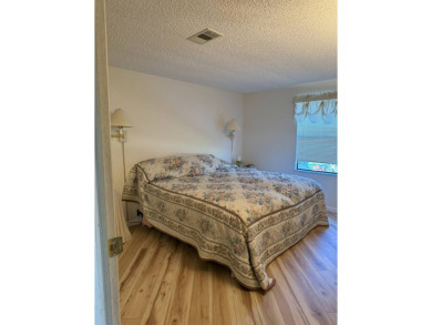 This lovely, manufactured home on leased land is located in Lake on Pine Lakes Country Club in Florida - for sale on GolfHomes.com, golf home, golf lot