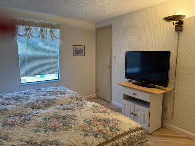 This lovely, manufactured home on leased land is located in Lake on Pine Lakes Country Club in Florida - for sale on GolfHomes.com, golf home, golf lot
