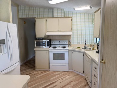 This lovely, manufactured home on leased land is located in Lake on Pine Lakes Country Club in Florida - for sale on GolfHomes.com, golf home, golf lot