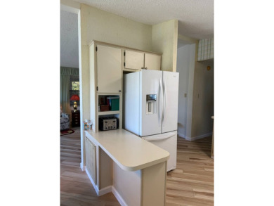 This lovely, manufactured home on leased land is located in Lake on Pine Lakes Country Club in Florida - for sale on GolfHomes.com, golf home, golf lot