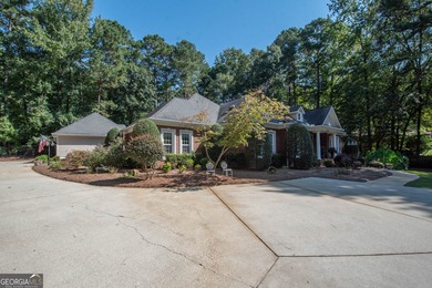 Welcome to this stunning custom ranch home in the prestigious on Whitewater Creek in Georgia - for sale on GolfHomes.com, golf home, golf lot