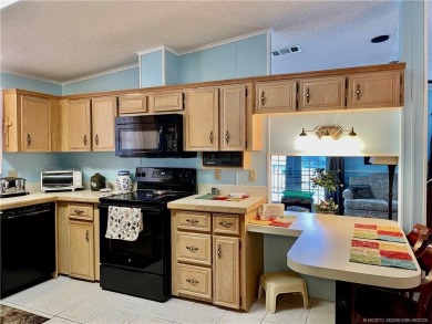 Charming 2/2 home filled with love. Enjoy the spacious front on Indianwood Golf and Country Club in Florida - for sale on GolfHomes.com, golf home, golf lot