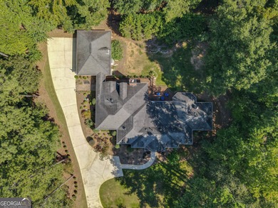 Welcome to this stunning custom ranch home in the prestigious on Whitewater Creek in Georgia - for sale on GolfHomes.com, golf home, golf lot
