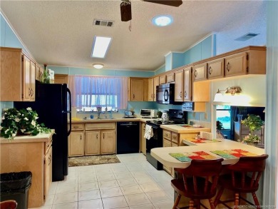Charming 2/2 home filled with love. Enjoy the spacious front on Indianwood Golf and Country Club in Florida - for sale on GolfHomes.com, golf home, golf lot