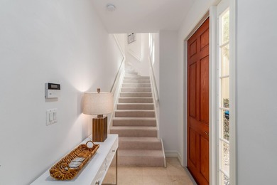 GORGEOUS corner unit - light, bright, and elevated for panoramic on Hammock Bay in Florida - for sale on GolfHomes.com, golf home, golf lot