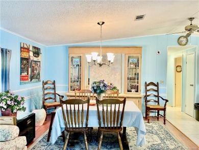 Charming 2/2 home filled with love. Enjoy the spacious front on Indianwood Golf and Country Club in Florida - for sale on GolfHomes.com, golf home, golf lot