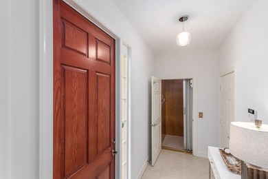 GORGEOUS corner unit - light, bright, and elevated for panoramic on Hammock Bay in Florida - for sale on GolfHomes.com, golf home, golf lot