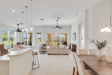 GORGEOUS corner unit - light, bright, and elevated for panoramic on Hammock Bay in Florida - for sale on GolfHomes.com, golf home, golf lot