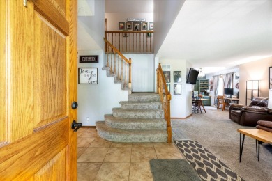 As lovely as ever!  This 4-bedroom home on a quiet dead-end on Treynor Recreation Area in Iowa - for sale on GolfHomes.com, golf home, golf lot