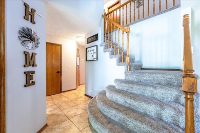 As lovely as ever!  This 4-bedroom home on a quiet dead-end on Treynor Recreation Area in Iowa - for sale on GolfHomes.com, golf home, golf lot
