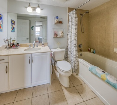 Discover your ultimate urban retreat in this one-bedroom on Lake Worth Municipal Golf Course in Florida - for sale on GolfHomes.com, golf home, golf lot