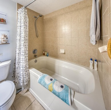 Discover your ultimate urban retreat in this one-bedroom on Lake Worth Municipal Golf Course in Florida - for sale on GolfHomes.com, golf home, golf lot