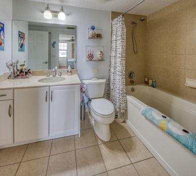 Discover your ultimate urban retreat in this one-bedroom on Lake Worth Municipal Golf Course in Florida - for sale on GolfHomes.com, golf home, golf lot
