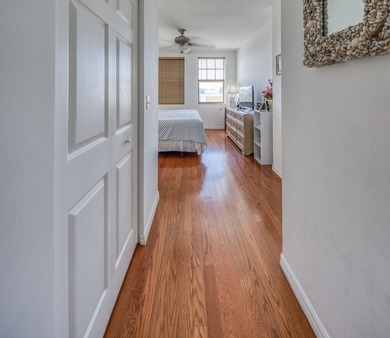 Discover your ultimate urban retreat in this one-bedroom on Lake Worth Municipal Golf Course in Florida - for sale on GolfHomes.com, golf home, golf lot